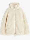 Beige en koffie lamswollen jas voor dames -fluffy en trendy - Bakkermode.nl