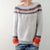 Dames gebreide pullover - grijze trui met patroon yoke en levendige boorden