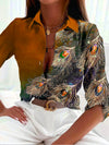 Dames blouse met pauwenveerprint - elegante geprinte top