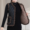 Gequiltte vest - stijlvolle gewatteerde damesgilet met pomponrand