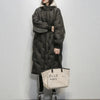 Gewatteerde oversized damesjas - winterjas met lange pasvorm - Bakkermode.nl