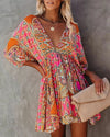Boho jurk met kleurrijk patroon en wijde mouwen - Bakkermode.nl